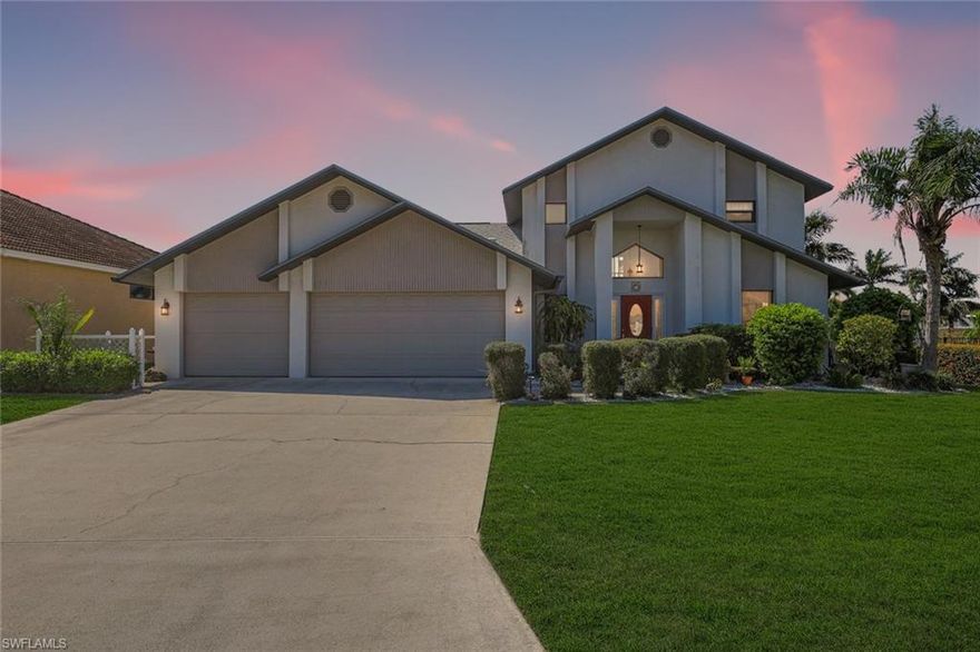 SOUTHERN EXPOSURE DIRECT GULF ACCESS POOL HOME W/ DOCK & LIFT MINUTES TO OPEN WATER! Welcome to a truly exceptional waterfront property in one of SE Cape Coral’s most desirable boating neighborhoods where every day feels like a vacation and the water is always calling. Perfectly positioned on a wide canal with quick access to open water, this home offers the ultimate Southwest Florida lifestyle with a private dock and 10,000 lb boat lift making it effortless to spend your days cruising, fishing, or enjoying breathtaking sunsets right from your backyard. From the moment you arrive, the inviting curb appeal, lush tropical landscaping, and striking entry set the tone for what’s inside. Step through the doors into a bright, open interior featuring soaring ceilings, abundant natural light, and a layout designed for both comfort and entertaining. The updated kitchen showcases quartz countertops, stainless steel appliances, and ample workspace flowing seamlessly into the main living and dining areas while multiple gathering spaces provide flexibility for everyday living and hosting guests alike. A desirable split floor plan offers privacy while the spacious upstairs retreat creates the perfect space for a primary suite, guest quarters, or private getaway. Step outside to your expansive screened lanai featuring a large covered living area, beautiful paver pool deck, and a sparkling pool surrounded by peaceful canal views. With southern exposure, enjoy sun filled days by the pool and stunning evening sunsets. The backyard is designed for the boating enthusiast complete with dock, lift, and direct Gulf access making this a rare opportunity for true waterfront living. Major updates include new impact doors and windows (2023), roof (2021), HVAC approximately 6.5 years old, water heater approximately 5 years old, updated electrical panel, irrigation system, and updated light fixtures and fans including patio fixtures and living room fans. No flooding or damage from any storms! Additional highlights include updated bathrooms, tile flooring throughout main living areas, fresh finishes, a dedicated laundry room, and a well maintained move in ready feel. Homes with this combination of exposure, access, and lifestyle don’t last—enjoy peaceful mornings or sunset views from your private screened second floor balcony and take advantage of this rare opportunity.