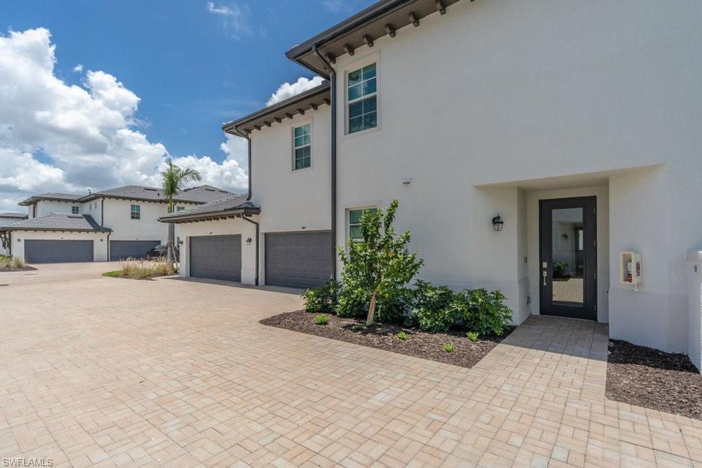 Photo of 16903 Fairgrove WAY #102, NAPLES, FL 34110 (MLS # 225077248)