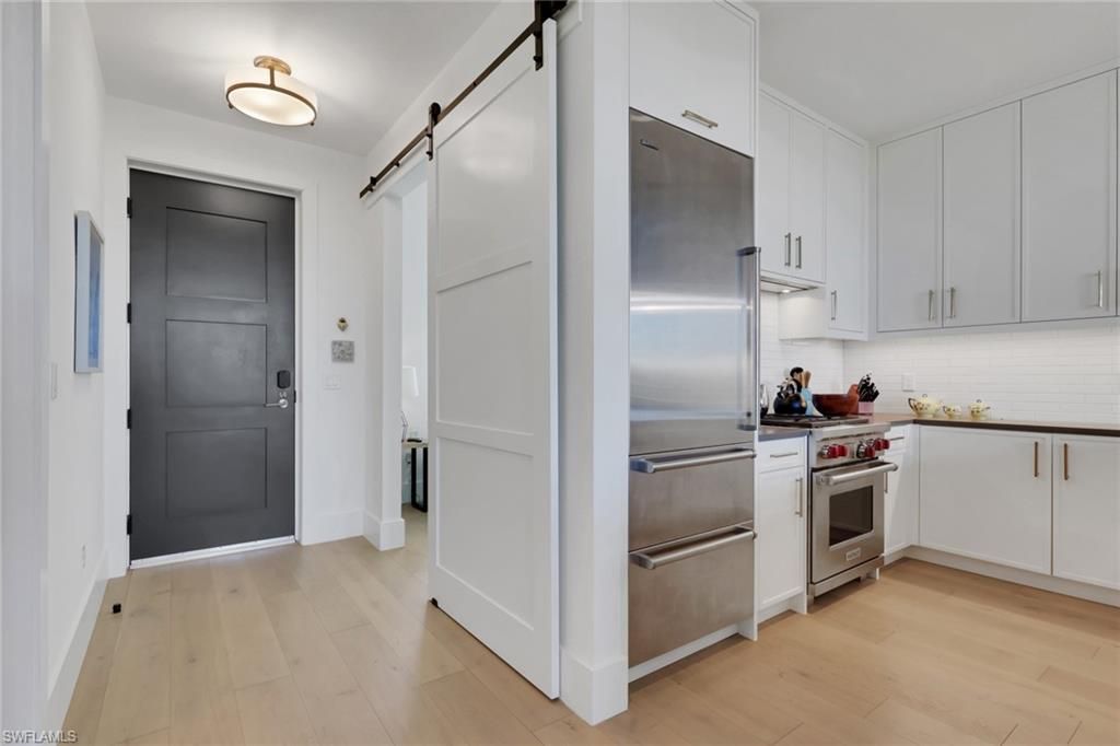 Photo of 850 Central Ave #303, NAPLES, FL 34102 (MLS # 225079831)