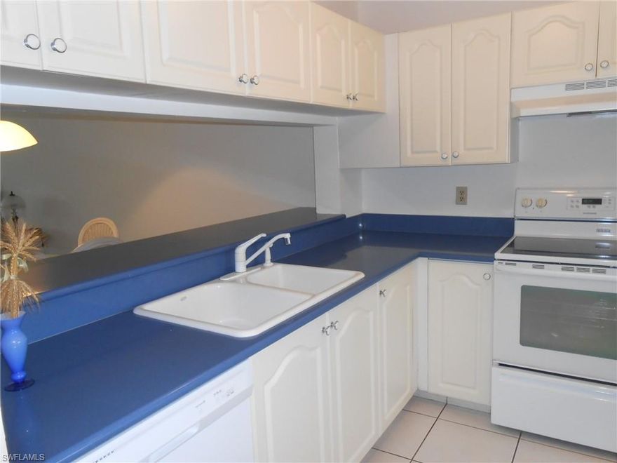 Great location near 5th Ave downtown Naples. Look no more! End unit with pool view. Good investment property with rental potential. Just installed new dishwasher and dryer. TOP FLOOR condo with newer tile floors, adorable eat in kitchen with updated cabinets and counter top. Extra Cabinets in dining room. Great for entertaining. Nice open floor plan with updated tile shower in bathrooms. Large walk in closet in Master bedroom. Balcony is tiled and over looks pool and lush landscaped area. Electric hurricane shutters on balcony and manual shutters on windows. Fantastic community with club house, community pools and docks for rent or purchase when available. Come see this well priced ready to sell garden apartment.