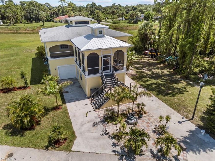 Amazing Stunning Key West styled 2 story Home with many upgrades! offers a beautiful cedar stained vaulted ceiling patio with porcelain tiled plank flooring, that leads into the main entry of this retreat, the open living room floor plan has another vaulted ceiling with transom windows & tiled floors throughout, 8ft. interior doors, eat in kitchen includes stainless steel appliances, breakfast bar New dishwasher & disposal 2020, the Master bedroom suite offers French doors that lead out to your 2 story screened balcony overlooking the pool, Master bath offers a large porcelain tiled walk in shower, tub, & double sink high top Vanity with walk in closets, their is another bedroom on the upper level also, downstairs offers 2 nicely appointed bedrooms, laundry, a full bath, & access out to the New screened private heated salt water pool oasis for all your entertaining 2016, New separate In Law Suite downstairs with tiled floors, full stainless kitchen & full tiled shower bath on its own zone of A/C, the garage has two doors but is 3 cars wide 20 x 40 underneath the house with high ceilings, New commercial H/WH, auto sprinklers, private back yard & street a must see home for the $$$
