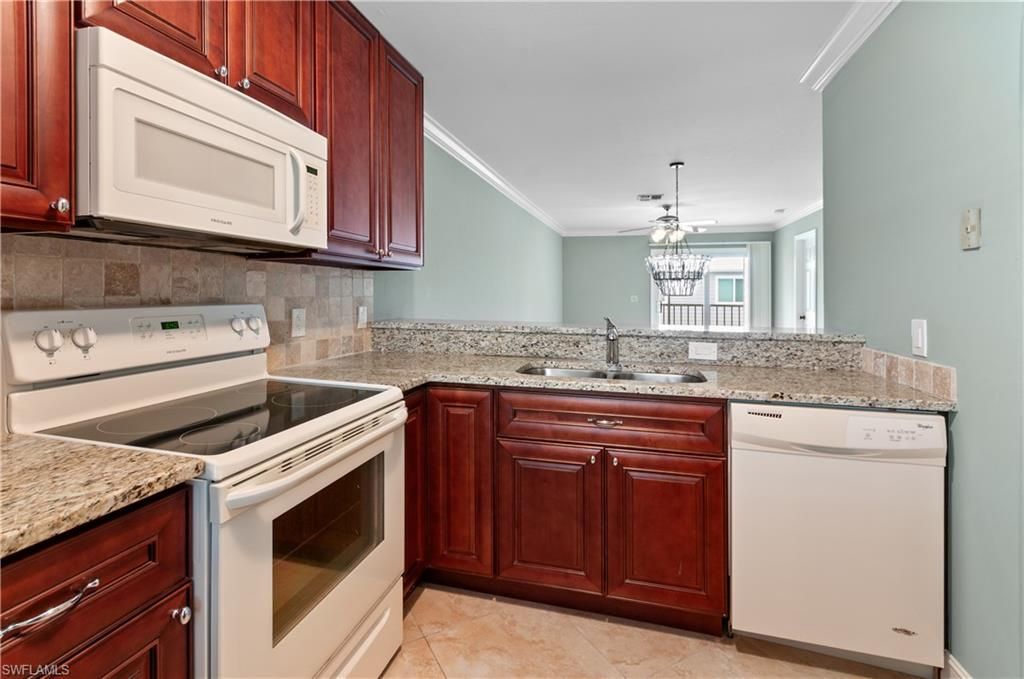 Photo of 829 W Elkcam CIR #2-208, MARCO ISLAND, FL 34145 (MLS # 226017932)