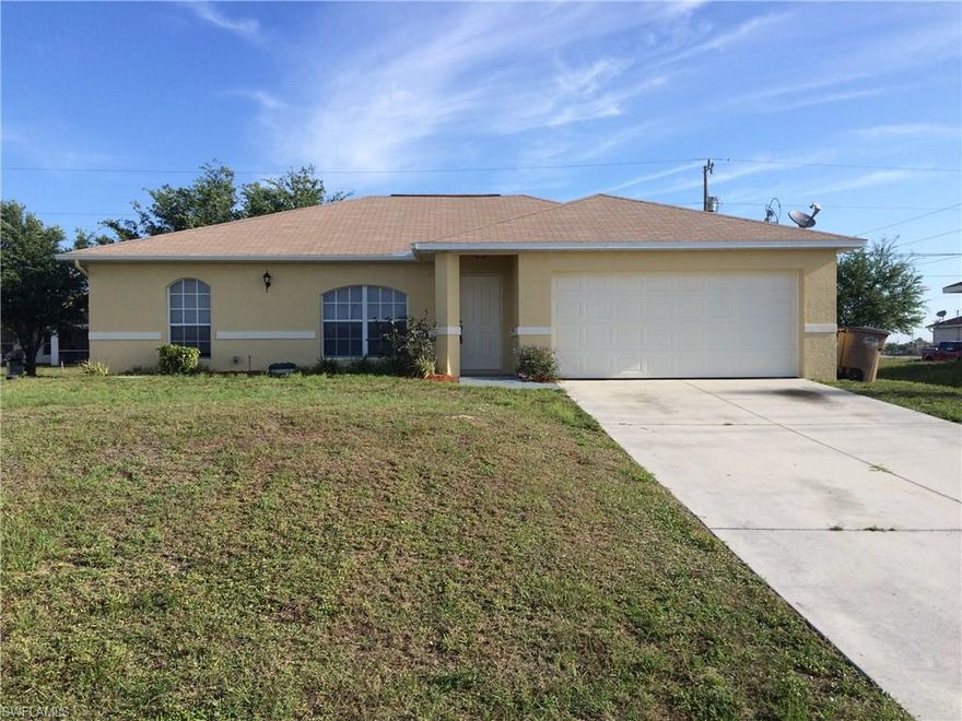 This wonderful 3/2/2 home in NW Cape features tile in the main areas and carpet in the bedrooms, large open kitchen. Other great features include: large master bath with separate corner garden tub and shower to relax in, sliding door leading out to screened lanai, laundry room located inside home, all appliances included, great location, plant shelves in the living room and much more!!! This property is priced to SELL fast so call today!!!!