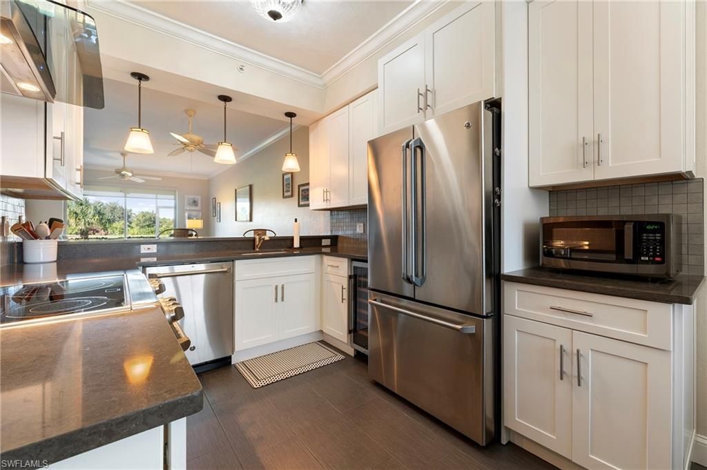 Photo of 9500 Highland Woods BLVD #105, BONITA SPRINGS, FL 34135 (MLS # 226005986)