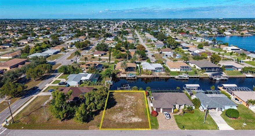 Beautiful lot in the sweet spot of SE/SW Cape Coral, ready to build your dream home. Older wooden dock in place and you would not need a permit to update the dock and lift. Come enjoy the nice quick right out to the river. Don't miss out!