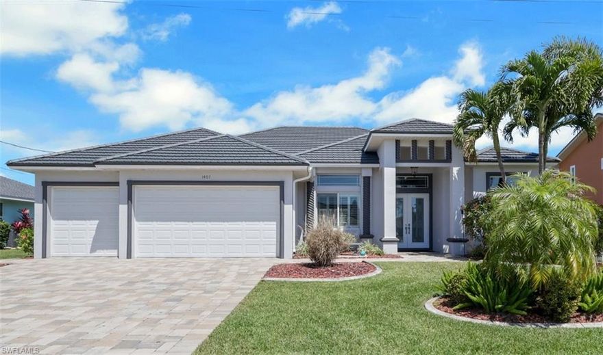This beautiful direct Gulf access property in Cape Coral south of Cape Coral Parkway (Unit 64) is a must see. This custom built home was built in 2014 and the current owners have owned it since 2016. The owners are from Great Britain and they do not rent the house out so it is in excellent condition! This location offers a very short boat ride to the Gulf as well as many of the fantastic shops and restaurants!  This 3 car garage house has 2453 Square Feet (3703 Square Feet in total) and has never flooded...sellers do have a flood insurance policy with an annual premium of $1725 which is transferrable. This house has a newer metal roof (2024) and is being sold TURNKEY!