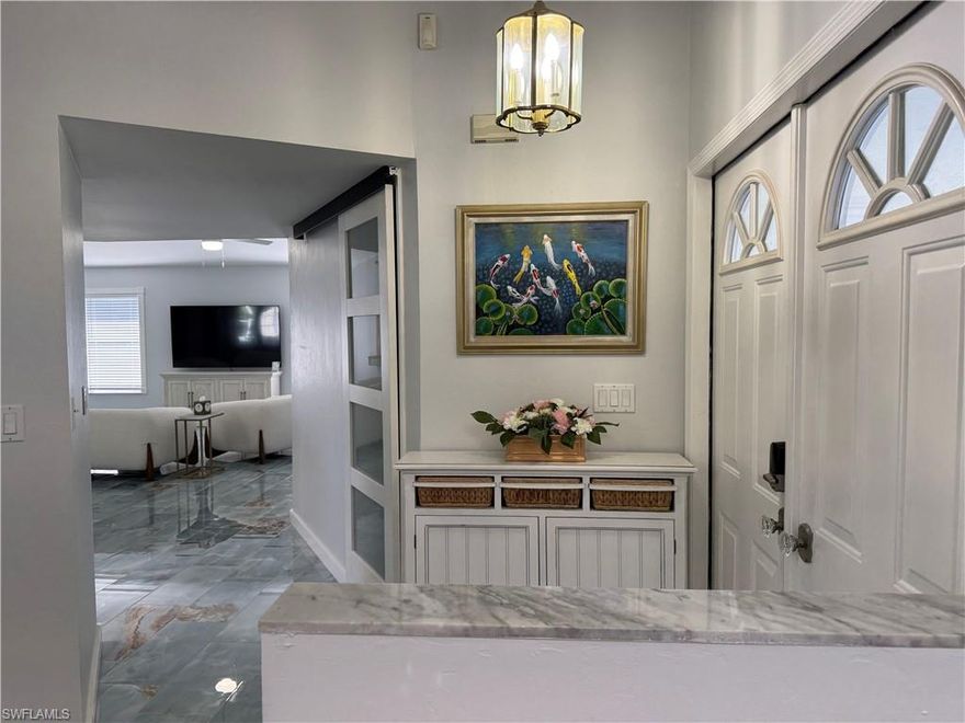 SHORT TERM RENTAL - POOL HOME 3 BEDROOM 2 BATH - Country Club Area of Cape Coral -  AVAILABLE FOR 2026 SEASON - FULLY RENOVATED -  Pet-friendly for smaller dogs, well-trained. 
Beautifully Renovated Pool Home -  Step into modern coastal living with this fully renovated home located in one of Cape Coral’s most sought-after neighborhoods. This 3-bedroom, 2-bath residence blends comfort, style, and outdoor enjoyment, offering the perfect retreat for seasonal escapes.
Inside, you’ll find a bright, open layout with updated finishes throughout, including contemporary flooring, refreshed bathrooms, and a sleek, modern kitchen designed for both everyday living and entertaining.
The true highlight of this home is the stunning outdoor oasis. A sparkling pool anchors the screened lanai, surrounded by ample space for lounging and dining. Just steps away, a gas-lit fire pit creates a beautiful evening ambiance—ideal for gathering with friends, enjoying quiet nights under the stars, or simply unwinding in your own private sanctuary.
With its prime location near the Yacht Club area, you’re close to parks, golf, dining, and all the conveniences Cape Coral has to offer.
This home is move-in ready, thoughtfully updated, and designed for effortless Florida