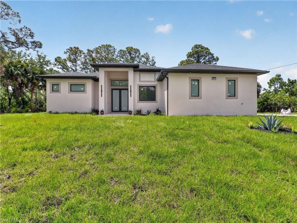 Photo of 2009 Dixie WAY, LEHIGH ACRES, FL 33972 (MLS # 226015891)
