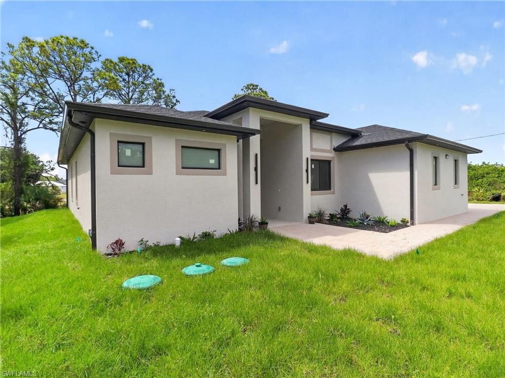 Photo of 2009 Dixie WAY, LEHIGH ACRES, FL 33972 (MLS # 226015891)