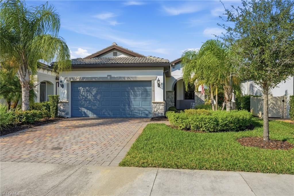 Photo of 12010 Westmoreland WAY, FORT MYERS, FL 33913 (MLS # 226012136)