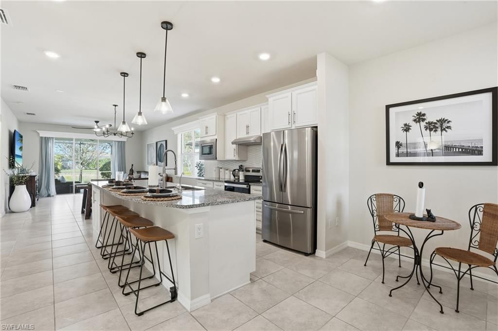 Photo of 12010 Westmoreland WAY, FORT MYERS, FL 33913 (MLS # 226012136)