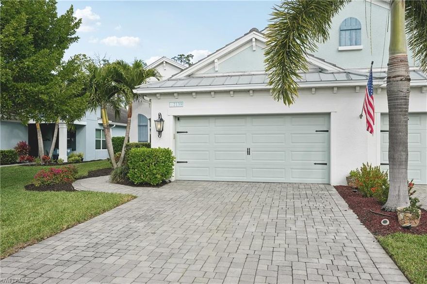Welcome to this beautifully designed attached villa in the highly sought-after Marquesa Isles of Naples. Built in 2018, this light-filled 3-bedroom plus den, 2-bath residence offers the perfect blend of modern comfort, thoughtful upgrades, and effortless Florida living.

The open-concept floor plan features tile flooring throughout the main living areas, creating a seamless flow from room to room. The gourmet kitchen is the heart of the home, complete with quartz countertops, stainless steel appliances, natural gas cooking, upgraded cabinetry, and a spacious island ideal for casual dining and entertaining. The living and dining areas open to a screened lanai, offering a peaceful setting with landscaped views—perfect for morning coffee or evening gatherings.

This home is equipped with smart home technology, allowing you to remotely control the alarm system, lighting, front door access, garage door, and thermostat. Whether at home or away, you can manage security and comfort with ease, adding convenience and peace of mind to everyday living.

The owner’s suite provides a relaxing retreat with a well-appointed bath and generous closet space. Two additional bedrooms and a versatile den offer flexibility for guests, a home office, or hobby space. A two-car garage adds convenience, and features such as central electric HVAC, natural gas service, and manual shutters further enhance comfort and functionality.

Residents of Marquesa Isles enjoy access to an impressive array of amenities, including a clubhouse, resort-style community pool and spa, fitness and social spaces, and a dog park. The gated community offers beautifully maintained streets and lush landscaping, creating an inviting neighborhood atmosphere.

Ideally located, this home provides easy access to the area’s most desirable attractions. World-class beaches along the Gulf of Mexico are just minutes away, offering pristine white sand and spectacular sunsets. Enjoy upscale shopping and dining at Mercato and Waterside Shops, explore the vibrant arts and cultural scene of downtown Naples, or spend the day on nearby championship golf courses. With convenient access to I-75, top-rated schools, healthcare facilities, and everyday essentials, everything you need is within reach.

This villa combines low-maintenance living, modern finishes, smart technology, and a prime Naples location—an exceptional opportunity to experience the very best of the Southwest Florida lifestyle.