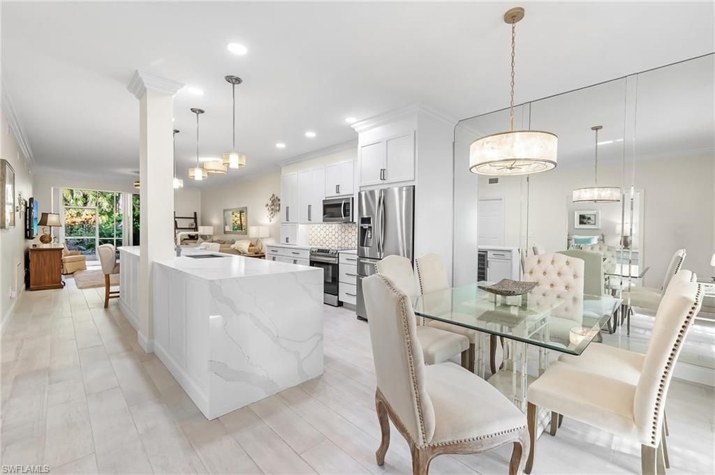 Photo of 859 Tanbark DR #104, NAPLES, FL 34108 (MLS # 224038582)