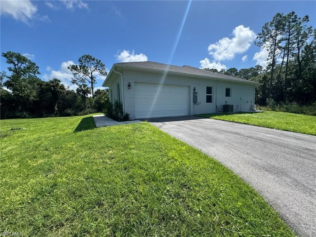 Photo of 2370 16th AVE NE, NAPLES, FL 34120 (MLS # 225077940)