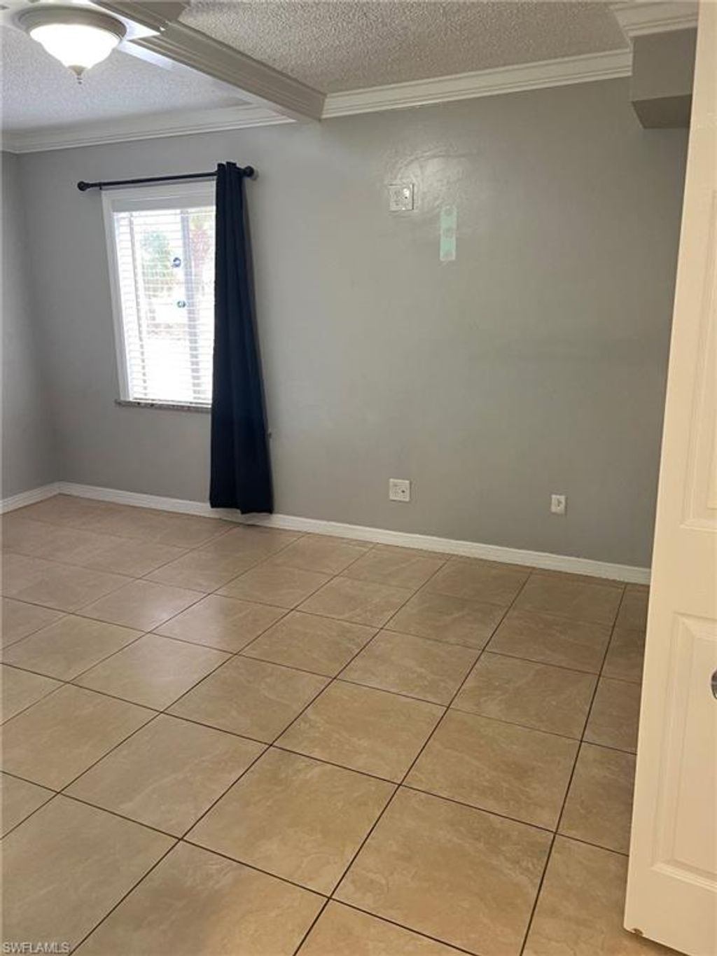 Photo of 7509 PITCH PINE CIR S #121, TAMPA, FL 33617 (MLS # 225083235)