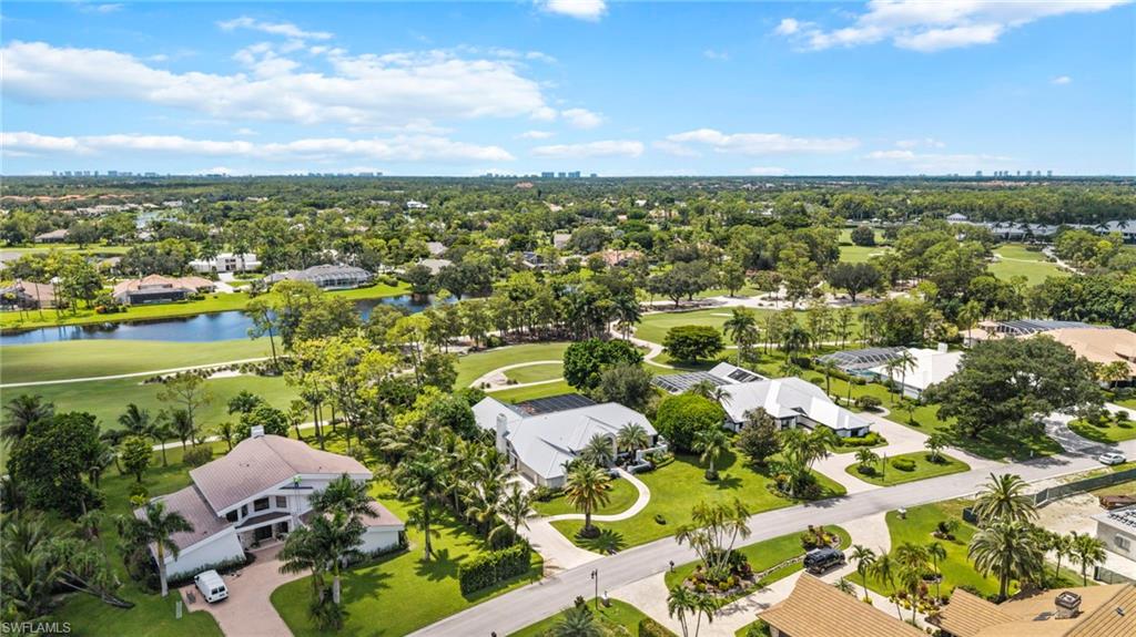 Photo of 13029 Bald Cypress LN, NAPLES, FL 34119 (MLS # 225067647)