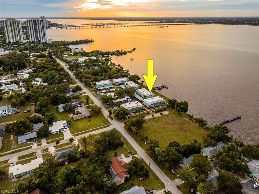 Discover serene riverfront living in this completely renovated first-floor condo in the charming River Garden community. With direct Caloosahatchee River frontage and northwest exposure, every day brings stunning waterfront views and unforgettable sunsets that make you feel deeply connected to nature. The location delivers peaceful living while being just minutes to historic Downtown Fort Myers with its vibrant dining, shopping, and cultural scene.

Inside, the space is thoughtfully designed and beautifully updated—featuring modern finishes and a smart layout that maximizes every square foot. The entire unit was beautifully renovated in September 2024, including a full plumbing update, Lovolor custom blinds throughout, and in-unit laundry—a huge bonus for convenience and everyday living—blending modern functionality with thoughtful details.

River Garden offers a small, quiet, park-like setting with river access, an extended fishing pier, kayak launch and storage, community boat dock, and scenic spots to relax and enjoy Florida’s natural beauty. Tarpon Pier has just reopened and is a 175-slip marina in a sheltered deep-water cove, offering fuel, pump-out, overnight docking, showers, shore power, boat and kayak rentals, and yacht or fishing charters. It’s the perfect place for fishing, enjoying sunsets, and connecting with the water.

The community itself is exceptionally well-maintained, with the roofing replaced in 2022 and the seawall in 2019. No outstanding or upcoming assessments are anticipated, and Building D illustrates what the completed patios will look like, with Building C patios expected to finish late February–early March.

This is a rare opportunity to own a truly special riverfront home that blends peaceful charm with modern comfort, in-unit convenience, and daily waterfront inspiration.