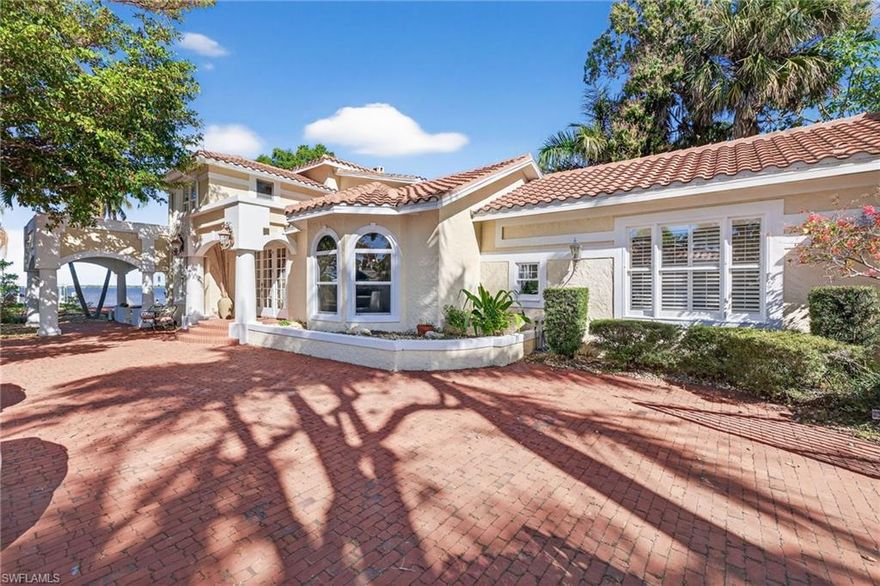 This exceptional 3 Bedroom + Den, 2.5 Bath riverfront residence offers direct Gulf access and sits on an expansive .61-acre estate lot with 116 feet of pristine Caloosahatchee River frontage. A masterful renovation of a classic 1926 Mediterranean home, the property reflects nearly a century of architectural pedigree—originally redesigned by Dan Sater, reconfigured and rebuilt in 1990, updated in 2010, and most recently transformed in 2023 with a sophisticated, modern aesthetic.  Additional structural and mechanical enhancements include a whole-house repipe and new roof in 2022, as well as a new A/C system, appliances and hot water heater in 2023.


A gated entry introduces the property with a grand sense of arrival, opening to a motor court and a detached three-car garage with the potential for a future guest house. Inside, the home blends timeless character with elevated luxury, featuring sun-drenched living spaces that capture sweeping river views. The first floor showcases elegant Travertine marble flooring, a wood-burning fireplace and a fully reimagined kitchen designed for both beauty and functionality.

The entire second level is devoted to a magnificent primary suite, offering exceptional privacy and a serene retreat. The primary bath features a large walk-in shower, jetted tub and dual European-style vanities.  A private balcony overlooks the pool, expansive rear lawn and the wide river beyond, creating a front-row seat to breathtaking panoramic vistas and unforgettable sunsets.

Perfectly positioned in the highly desirable Valencia Terrace neighborhood, along the McGregor Corridor and just one mile from Downtown Fort Myers, this residence offers the freedom of no HOA or restrictions. With unmatched privacy, historic charm, and true waterfront living, the property stands as a rare offering. The adjacent lot is also listed for sale, presenting an extraordinary opportunity to expand or create a multi-parcel riverfront estate.