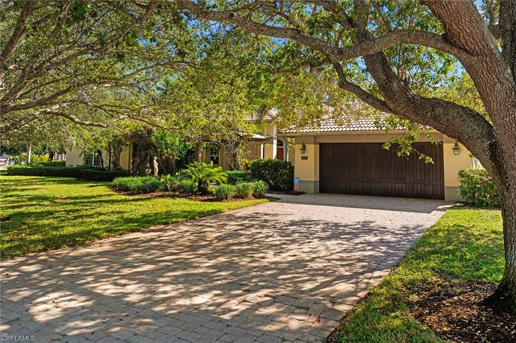 Photo of 8840 Mariposa CT, NAPLES, FL 34113 (MLS # 225083694)