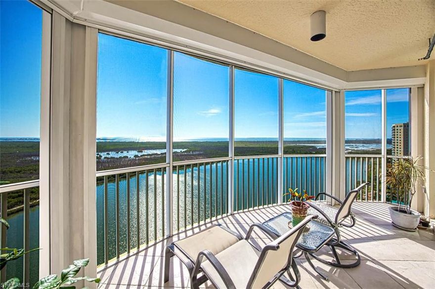 THE TOTAL PACKAGE! TOTALLY RENOVATED interior w/STUNNING VIEWS. West vistas can be appreciated from most rooms & 2 screened balconies. From the 16th floor, looking west, you see Sanibel, clearly identified by the historic lighthouse, situated between the Gulf & Bay. You can even see the river as it makes its way to the Bay. Regularly, you will experience an explosion of color as the sun sinks into the watery horizon. To the south you overlook a shimmering, 25-acre lake, 700+ acres of preserve land, FMB, the Bay & panoramic views of the Gulf’s shoreline along Estero Island. Turning your sights inside to the recently renovated & barely used interior, you will find a spacious living/dining area. Natural light streams in from a large impact window & sliders which access 2 lanais (both are tiled & have hurricane shutters). Summer of ‘25 renovations were done by Cornerstone. The kitchen has all new, white, Shaker-style cabinetry w/pull-outs & slide spice-rack. Granite counters & backsplash, 2 bars, SS GE Profile appliances, cook-top w/SS hood. Positioned central in the condo, the kitchen is the heart of the home & open to the living/dining area. A breakfast room or flex space is also open to the kitchen.
New wood-look tile runs throughout the condo–no carpet! The primary retreat accesses one of the lanais, has a large window that invites the light in & frames views, 2 walk-in closets & attached primary bathroom featuring new white Shaker style cabinetry. More storage was created by removing a soaking tub. 2 separate sink vanities provide personal space. A walk-in shower w/new tile, frameless shower door, stone floor & private commode closet complete the spa like feeling. One the condo’s opposite sides are 2 guest rooms, 1 is a secondary en suite. A split plan affords owners & guests privacy. The in-suite bathroom has new white, Shaker style cabinets, granite, new shower tile & frameless shower door. A 3rd guest bathroom has a pedestal sink, new tile in tub/shower enclosure & frameless door. The 2nd guest room is being used as an office/den. Both guest rooms have crown molding, plantation shutters & the same wood-look tile flooring. A generous laundry w/new white Shaker-style cabinets, soaking sink & closet make doing laundry a bit more pleasurable. A storage closet is steps outside the back doors. A 2-car garage & large a/c storage room on the 2nd level & dehumidified storage located on the 1st level convey. Located on 50+ lush, tropical acres w/a 25-acre shimmering lake gives this low-density community privacy & space to spread out.  A shell path follows the lake’s shore. A 6000+’ clubhouse includes fitness center, yoga studio, billiard/poker room, gathering space, dining area, media/meeting room, screened lanai & covered dining. On the edge of the lake sits a resort style, salt-water pool & spa. Bocchi, tennis/Pickleball & dog park are also avail. for your use. Beyond the gates, walk to the beach, restaurants, shops, grocery & bike to Sanibel & FMB.