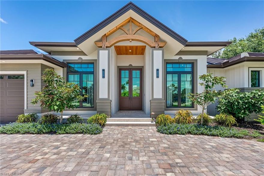 This one of a kind home sits in a prime location just one mile from the beach! New construction and fully custom built in 2025 includes 5 bedrooms, 4 bathrooms, expansive kitchen, 2 car garage, salt water pool with spa and sun shelf, and outdoor barbeque. As you walk through the 10 foot high front door you have the benefit of an open concept living space that perfectly blends a coastal and elegant feel. Master bedroom offers his and her closets and vanities, separate toilet room, expansive shower with dual shower heads with rain shower. The living room includes a custom built shiplap accent wall with television and electric fireplace. 10' sliders give sweeping views of the extensive lanai with multiple seating areas, outdoor shower and green space. The home is completely equipped with GE Cafe gas appliances drawing from the 500 gallon propane tank included on property. The custom finishes and detailed wood ceiling accents are the perfect example of artisanal craftsmanship. This home does not disappoint in any area and as a builder product, warranty is still in place. Fully or partially furnished it is ready for you to start your dream of island living today!