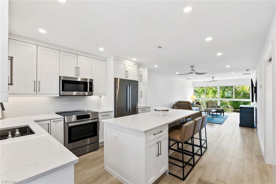 One of the most fabulous renovations in Village Green! Move in ready from a beautiful kitchen and large island stocked with Bosch appliances, decked out bathrooms, stunning flooring, recessed lighting, and all ready to go for you to enjoy! 
618 Broad Avenue South presents a rare opportunity to own a refined top-floor retreat in the heart of Olde Naples. Privately positioned within the intimate Jasmine Club, this elegant residence is bathed in natural light, offering an airy, sophisticated ambiance that immediately evokes relaxed coastal luxury. Just steps from the pristine Gulf beaches and the celebrated boutiques and dining of 3rd Street South, the location delivers an effortless lifestyle defined by walkability and exclusivity. Inside, expansive windows invite sunlight to pour through the living spaces, enhancing the home’s serene atmosphere while showcasing its elevated position within the building.
Thoughtfully appointed and impeccably maintained, this residence is perfectly suited as a chic seasonal getaway or a full-time sanctuary. 
Set within a well-kept 55+ community, residents enjoy a peaceful environment with the flexibility to further personalize the home, including the potential for in-unit laundry. With its premier address, timeless appeal, and exceptional proximity to Naples’ most coveted attractions, J618 embodies the essence of sophisticated coastal living.