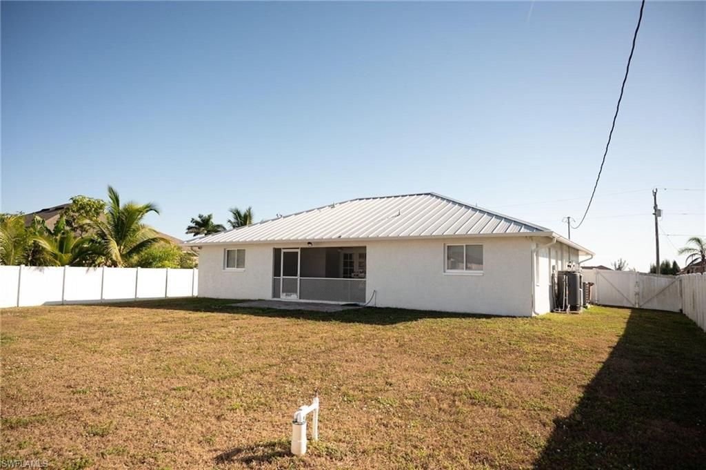 Photo of 113 NE 11th TER, CAPE CORAL, FL 33909 (MLS # 225083443)