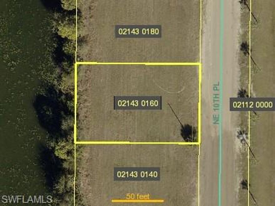 BEAUTIFUL FRESHWATER LOT WITH ALL CITY UTILITIES!!!  Discover this spacious vacant lot located in the rapidly developing northeast corridor of Cape Coral.
With direct freshwater canal frontage, the property offers ample space for a single-family residence. 
Whether you're a builder, investor, or future homeowner, this parcel is a smart buy in an up-and-coming area. 
Just minutes from shopping, dining, schools, and parks, it’s the perfect canvas for your Florida dream home.