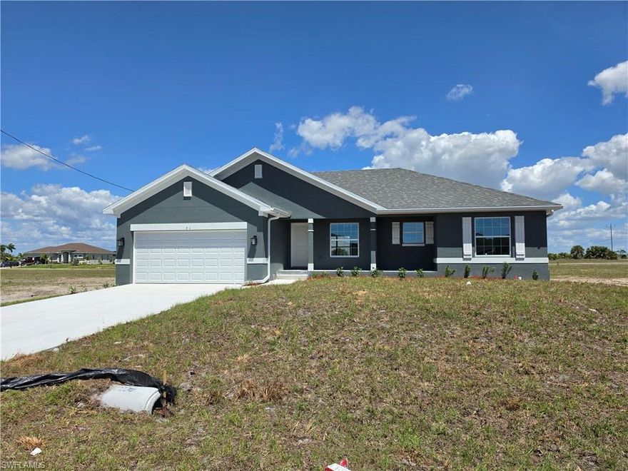 New Construction Perfection in NW Cape Coral - Experience the pinnacle of Florida living in this stunning, newly constructed 3-bedroom, 2-bathroom home located in the highly sought-after Northwest Cape Coral area. Designed with modern elegance and durability in mind, this residence offers an open and airy floor plan perfect for both relaxing and entertaining.

Interior Highlights

Gourmet Kitchen & Baths: Features sleek granite countertops paired with high-quality cabinetry.

Modern Appliances: Fully equipped with a premium stainless steel appliance package.

Premium Flooring: Enjoy the clean look and easy maintenance of tile flooring throughout the entire home—no carpet!

Elegant Entryways: Beautiful French doors provide a grand transition to your outdoor living space.

Outdoor Living & Exterior

Covered Lanai: Step outside to a spacious covered lanai, ideal for enjoying your morning coffee or evening sunsets.

Pristine Landscape: The home features a complete grass package maintained by a fully automated digital sprinkler system, ensuring effortless curb appeal year-round.

Location
Situated in a rapidly growing section of NW Cape Coral, you are just minutes away from local parks, boat ramps, and dining. This home combines the peace of a residential neighborhood with easy access to everything Southwest Florida has to offer.