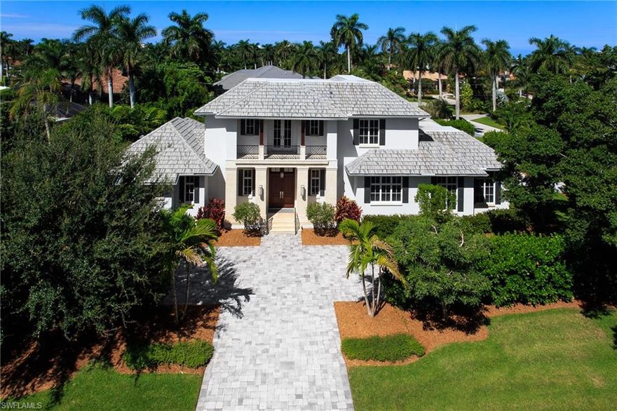 Immaculately kept, custom built home, on a lush landscaped corner lot. Fine features & details include: Andersen impact windows & doors; Whole house Savant Pro audio visual system; Monitor audio speakers; 5.1 surround system; 85” Sony TV with Leon sound bar; Mounted TV’s in office bedrooms & loft; Icreal time monitored security system; wide plank European white oak hardwood; custom mill-work; Hunter Douglas Silhouette window treatments throughout, with electric controls in master bedroom & kitchen; limestone patios, pool deck & accents; Gourmet kitchen with 2 sub-zero refrigerators, 2 dishwasher & a butler’s pantry; master suite has his and hers walk-in closets & his and hers water closets; Lanai has gas fireplace & summer kitchen, enclosed by remote controlled screens & shutters; gas heated pool & spa; 2nd-story has 3 private suites, a breakfast bar, bonus room, balcony & a 2nd laundry; concrete floor system for second floor; 3 a/c units; 2 Ultra-Aire Whole House De-humidification units, with fresh air intakes; spray foam insulation; tank-less water heaters; propane gas. List of additional features & specifications attached.