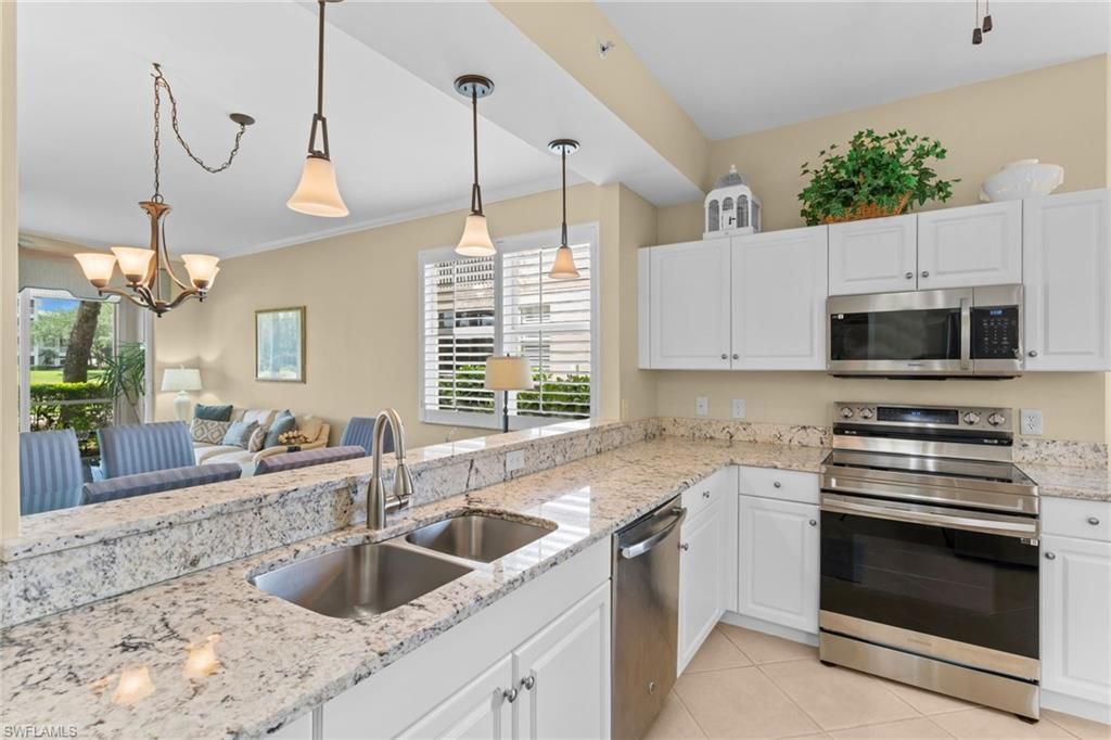 Photo of 3980 Bishopwood CT E #4-106, NAPLES, FL 34114 (MLS # 226014185)