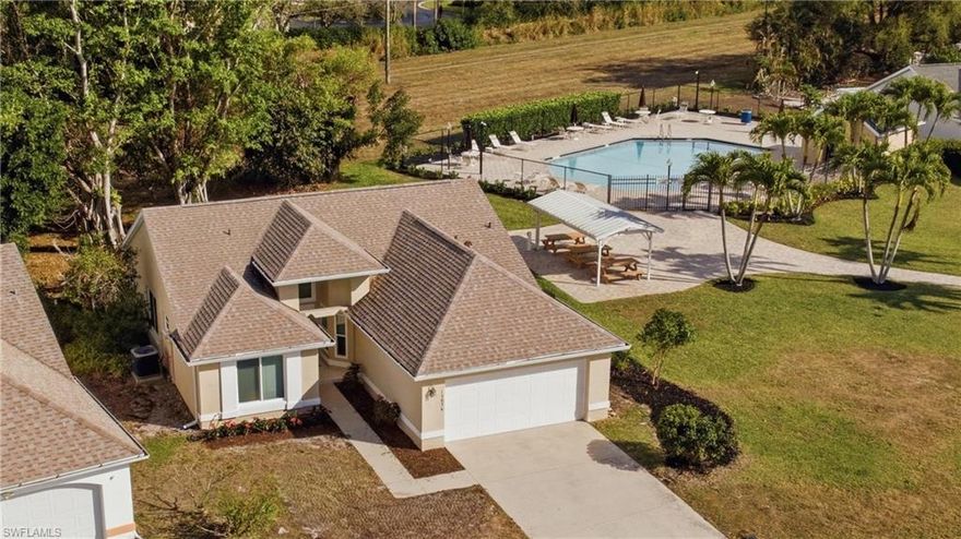 Perfect Location and priced to move! Adjacent to The Meadow community pool. Approximately a 15 minute drive to both Fort Myers beach and Sanibel Island! Minutes from great restaurants, shopping, grocery shopping, Lakes Park, Healthpark Hospital, and county library. The rear of the home also features a large easement which ensures future privacy from further home construction. This home has many recent upgrades including: New roof in 2023, AC in 2023, Impact windows throughout in 2024 (with exception of the sliding door), and hot water heater in 2025. With the very low HOA fees, it gives you access to the bountiful amenities the community has to offer! This includes the community center, fitness center, three pools (including the large community center pool, the one adjacent to the home, and a lap pool), eight pickleball courts, two tennis courts, two racquetball courts, basketball court, fishing pier, shuffleboard, bike and walking trails, and playground.