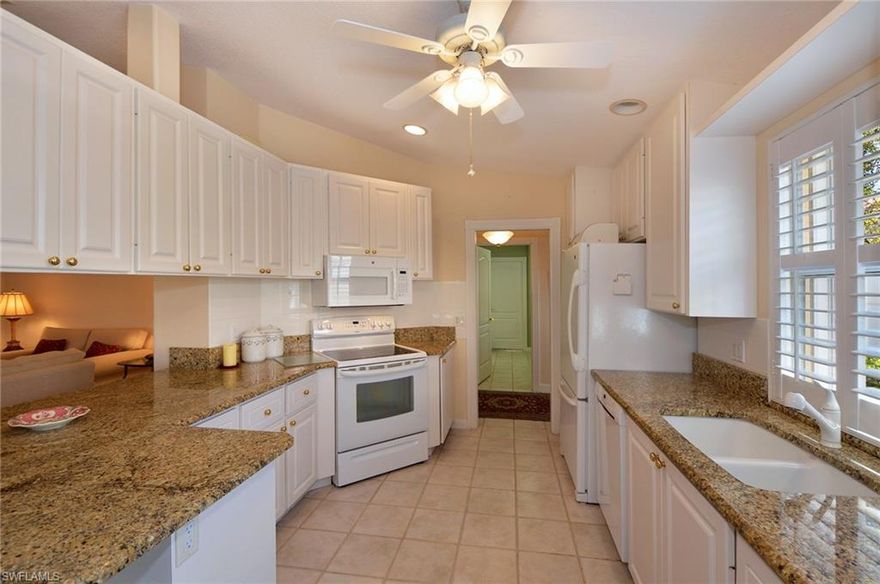 PRICED TO SELL! Your most discriminating client won't want to miss this CREAM PUFF! Among updates too numerous to list them all include: AC and all kitchen appliances replaced by current owner, washer/dryer 2 yrs new, ALL TILE throughout, gorgeous granite counters in kitchen and both baths, and newly tiled/sliding glass master shower enclosure. Beautifully landscaped and very private easy-care backyard garden affords gorgeous sunset skies! All windows boast tasteful plantation shutters, with accordion storm shutters outside for easy close up when you leave. Windows on non-adjoined side of home face South for all day "light/bright!"  Standard awesome DiVosta features are built-ins in all closets, tile roofs, pavered walkways/driveways.  Note Drummond is near the front of Island Walk, so very quick and easy to get in and out the gate.  Avoid seasonal traffic enjoying the fabulous Town Center amenities including huge fitness center, post office, 2 large pools (one resort-style and one for laps), casual restaurant for enjoying poolside meals, tennis, bocce, gas station, car wash, beauty shop and more.  Tons of activities and clubs available.  Low fees incl. lawn/landscaping/irrigation!