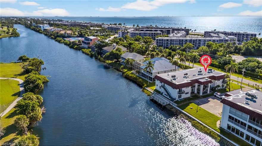 All Assessments have been Paid in Full!!! Sanibel Island Escape – Fully Remodeled and Move-In Ready. Step into your slice of paradise with this beautifully updated one-bedroom, one-bath, Smart House with Nest Thermostat perfectly designed for comfortable island living. Ideal as a vacation home or an income-generating rental, this property boasts a complete remodel, blending modern style with thoughtful functionality. The kitchen shines with quartz countertops, high-end Smart stainless-steel appliances, and a convenient breakfast bar. It opens effortlessly to the spacious living area and an integrated air-conditioned porch, where you can unwind while taking in tranquil views of the Sanibel River and its abundant wildlife. Warm wood accent walls and porcelain tile floors throughout add character and charm. The luxurious bathroom features a frameless tile shower, sleek vanity, and updated lighting, while the primary suite offers a spacious walk-in closet with a custom organization system. Just a 5-minute stroll to your deeded beach access, this centrally located condo provides easy access to island amenities. Relax by the pool, cast a line from the fishing platform, or explore the area by bike. Embrace the island lifestyle in this fully upgraded retreat – your dream awaits!