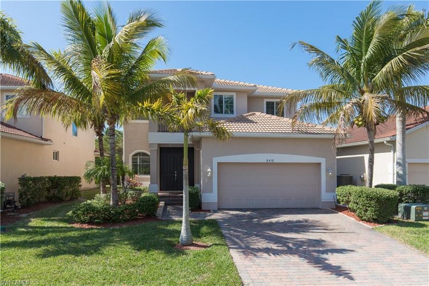 Captivating 4 bedroom 2.5 bath home in Catalina Isles - a beautiful gated community in fabulous South Fort Myers location.  Two story home abounds with room for everyone!  Spacious kitchen with granite counters, center island, breakfast bar, nice wood cabinetry, stainless steel appliances, pantry and great breakfast nook. Home offers formal living room and formal dining as well as family room. Tile floor and crown molding throughout first floor and nice wood laminate flooring upstairs.  2nd floor offers large master retreat with double doors, tray ceiling, sitting area, and sizzling master bath with soaking tub, separate shower, double sinks and 2 w/i closets.  Generous size guest bedrooms.  Nice inside laundry with cabinets & utility tub; lots of storage in this home with large under stair storage closet and wonderful overhead storage system in garage.  Storm panels & reinforced garage door for storm protection.  Friendly community offers wonderful community center with large pool, fitness center, playground, and beautiful picnic area on the lake.  Great location close to beaches, shopping, and restaurants!  So much to offer!!!  Vacant and easy to show!