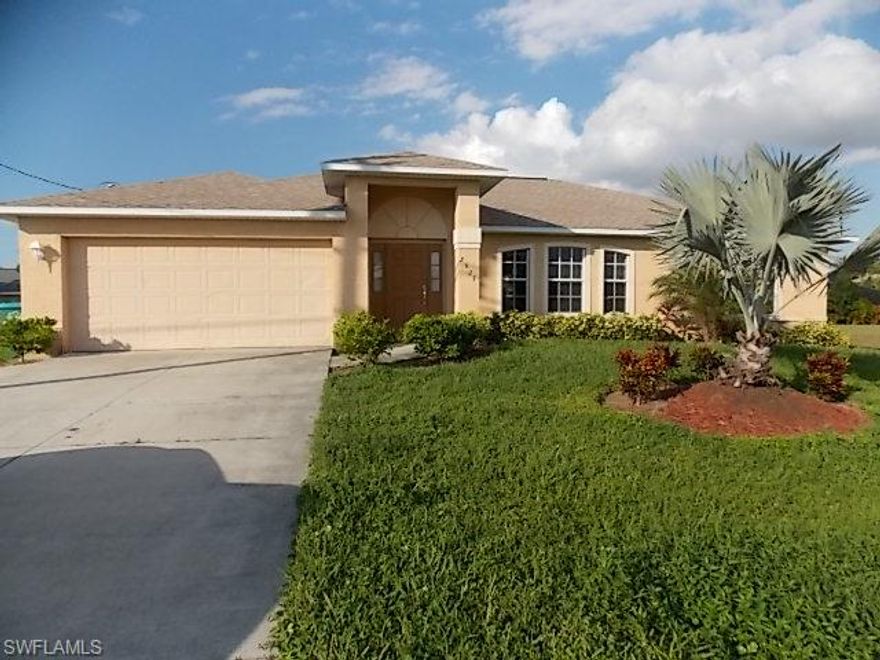 Beautiful 3 bedroom / 2 bathroom single family home with attached 2 car garage in Cape Coral. This home features a spacious living room, tile and laminate flooring throughout the entire home, and an open kitchen with breakfast bar, pantry, and dining area. Also enjoy a large master suite with dual sinks in the master bathroom and large garden tub. There is also plenty of room for a pool.