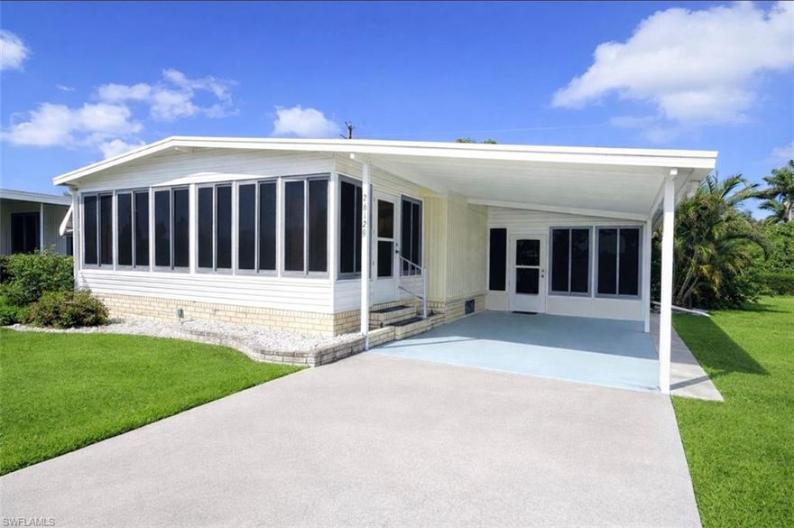 Welcome to this well-maintained 2-bedroom, 2-bath home in the desirable Imperial Harbor 55+ community. This home features carpet throughout the main living areas, with durable vinyl flooring in the kitchen for easy maintenance. The master bedroom offers a comfortable retreat with an en suite bathroom. The hallway leading from the bedroom to the bathroom features two closets, one of which is a walk-in, providing ample storage. The master bathroom has a fully tiled walk-in shower, mirrored medicine cabinet, additional wicker storage, and a vanity with cabinets beneath. The guest bathroom also features a mirrored medicine cabinet and a vanity with cabinets. The hallway leading to both bathrooms includes three separate linen closets for added convenience. The living room is warm and inviting, highlighted by a three-panel mirrored accent wall and sliding glass doors that lead into the Florida room. Surrounded by windows, the Florida room features vertical sliding glass panels that allow you to enjoy either enclosed comfort or fresh breezes with screened ventilation. It also has a door leading out to the carport. The dining area includes a built-in cabinet with glass-accented upper doors, a long countertop, and additional storage below, perfect for display and functionality. The kitchen features track lighting over a peninsula-style breakfast bar, offering additional prep space and casual seating, along with a deep pantry cabinet and a dedicated laundry closet with built-in shelving for additional storage. A door from the kitchen leads to the lanai, which is filled with natural light through vertical sliding glass panels, offering flexibility between screened airflow and enclosed comfort. It also provides multiple access points, including doors to the carport, backyard, and a spacious shed. The large shed includes several windows for natural light, along with a long built-in workbench and multiple metal shelving units, ideal for storage, hobbies, or workspace needs. Backing up to a private natural setting, this property offers peaceful views with no rear neighbors, creating a quiet and relaxing outdoor environment. This home comes with a harbor club membership, a $1,500 value that gives you access to the club house, heated community pool, bocce, billiards, gym, shuffleboard, and library.