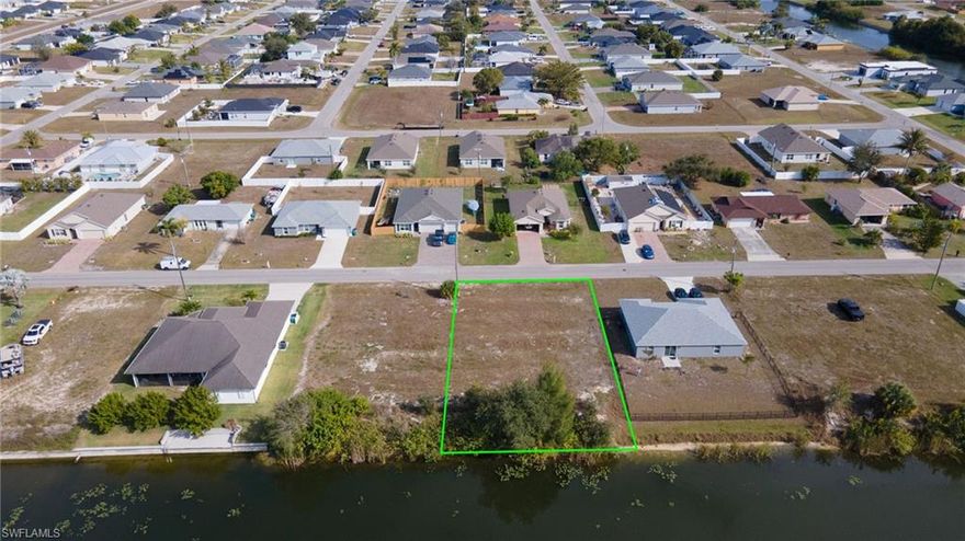 Prime vacant lot in desirable Cape Coral with city water in place and freshwater canal frontage. Located in a no flood zone, offering lower insurance costs and added peace of mind. Ideal opportunity for a builder to create their next project or for investors seeking strong long-term potential in a fast-growing market.