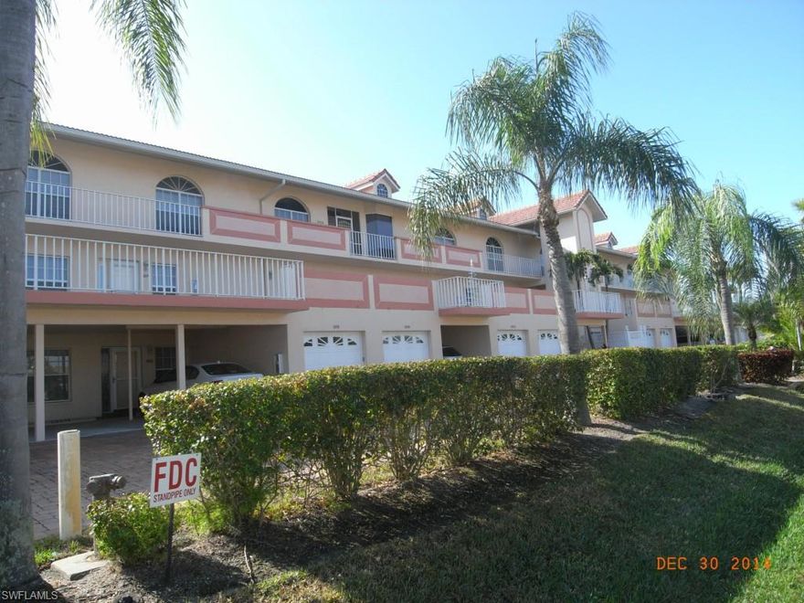 Desirable, direct access , southern exposure on a wide gulf access channel. Boating access just minutes to open water from your own 12k BOAT LIFT. Wide open, home sized comfort with the great room design that comes FURNISHED and ready now to be your vacation home. Enjoy the breezes and your View of the canal and boat slip from your over sized  tiled lanai with electric shutters. Not like any other ordinary condo this home has recessed ceilings with cove lighting, rounded walls, built in bar and was designed for Florida entertaining. Spacious master retreat with windows facing the water view and sliding glass to the patio. The mstr bath has Large walk in closet, separate garden tub ,tiled shower and dual sinks  Your guests are well suited on their split design separated from the master. Enjoy cooking in the bright open kitchen with casual break fast area in kitchen and adjacent formal dine area. Inside laundry area, central vac, and newer plumbing and private garage are additional features. Parkway East  is well maintained and upscale looking complex with barrel tile roof and brick paver drives. Tree lined side walks lead to family friendly Jaycee riverfront park ..