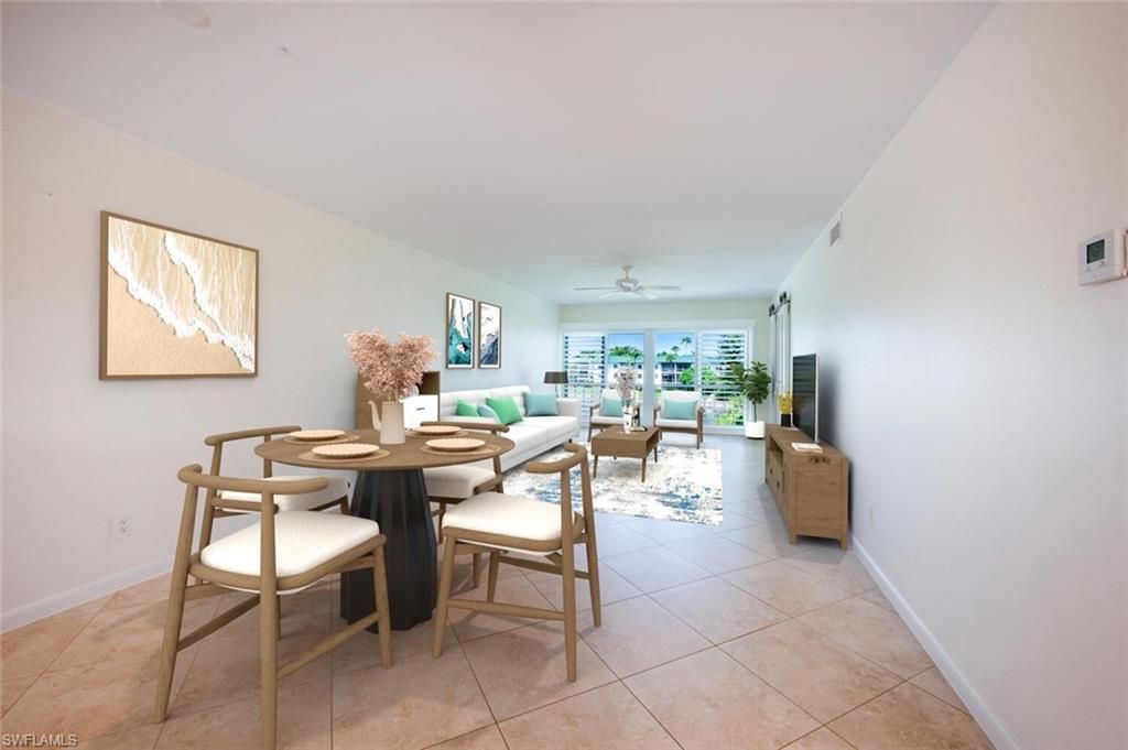 Photo of 3055 Riviera DR #306, NAPLES, FL 34103 (MLS # 225053936)