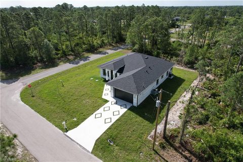 Photo of 1126 Crestwood ST E, LEHIGH ACRES, FL 33974 (MLS # 226015409)