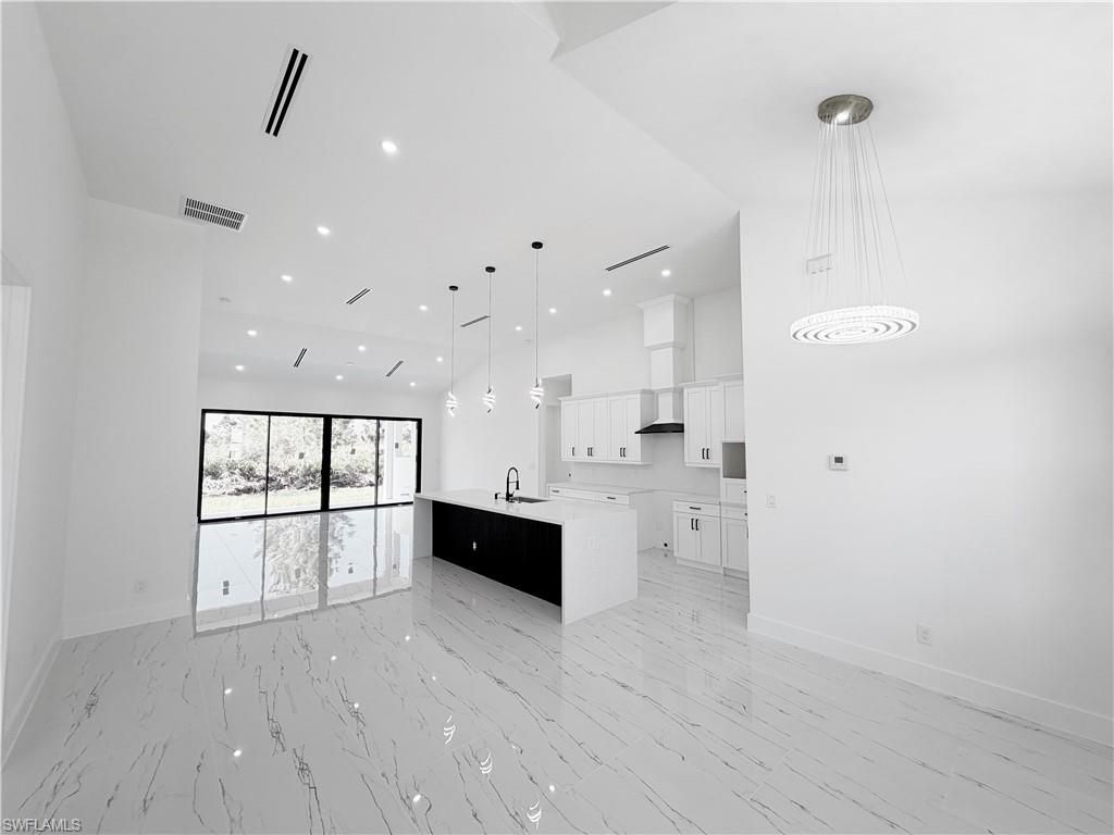 Photo of 1126 Crestwood ST E, LEHIGH ACRES, FL 33974 (MLS # 226015409)