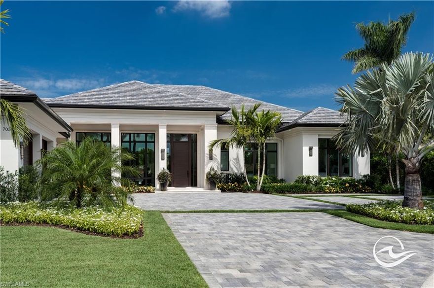 Breathtaking lakefront coastal contemporary estate. Designer details astound from the moment you enter the home. Floor-to-ceiling glass windows flood the home with natural light. With wide plank oak floors throughout, the chefs kitchen and butler’s pantry make this home an entertaining dream come true. Four en suite bedrooms, an indoor and an outdoor great room, family room, kitchen, office, butler’s pantry, and 3 car garage all overlooking a gorgeous lake view. Situated on the cul-de-sac on a quiet street in Pelican Bay, moments from Waterside, Artis Naples, Mercato. Pelican Bay offers miles of sandy beach, 2 beach clubs with dining, cocktails, and beach service; a competitive tennis program; kayaks, fitness center.