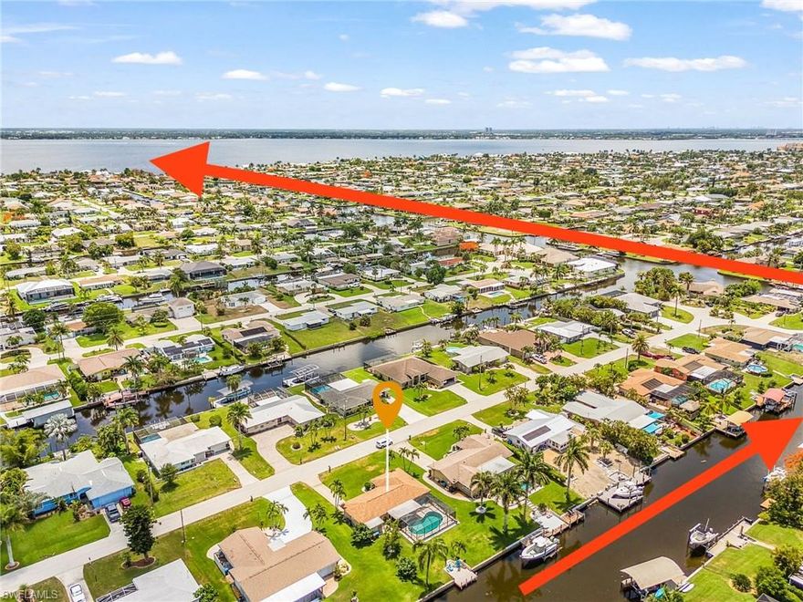 3022 is currently rented (AIRBNB) until June 1. Will be available to preview in person on June 2- June 7. 3018 is available for showings.
3018 & 3022 SE 17th Place — Exceptional Dual-Property Opportunity

Rare package deal featuring two homes on a prime oversized homesite with endless possibilities. Keep the current income-producing setup by Airbnb’ing one property while living in the other, or build your dream waterfront McMansion in this highly desirable location.

This beautifully updated residence offers 2 bedrooms, 2 bathrooms, a spacious great room, and a bright Florida room designed for relaxed coastal living. The home has been tastefully remodeled with a modern kitchen featuring a large island, new cabinetry, and updated appliances.

Enjoy peace of mind with extensive upgrades, including renovated bathrooms, impact windows, new tile flooring, and a screened-in pool overlooking a quiet canal. Boaters will love the quick access with only one left turn to the Caloosahatchee River, Gulf, and Intracoastal Waterways.

Recent Upgrades Include:
• Impact Windows (2026)
   New Pool Heater
• Roof (2019)
• A/C (2017)
• Pool Cage (2017)
Cornwallis is a very desirable community with walking/bike paths to the River.
An incredible opportunity for investors, seasonal residents, or buyers seeking the ultimate waterfront lifestyle.
NEVER FLOODED AND NOT LOCATED IN THE MANDATED FLOOD ZONE