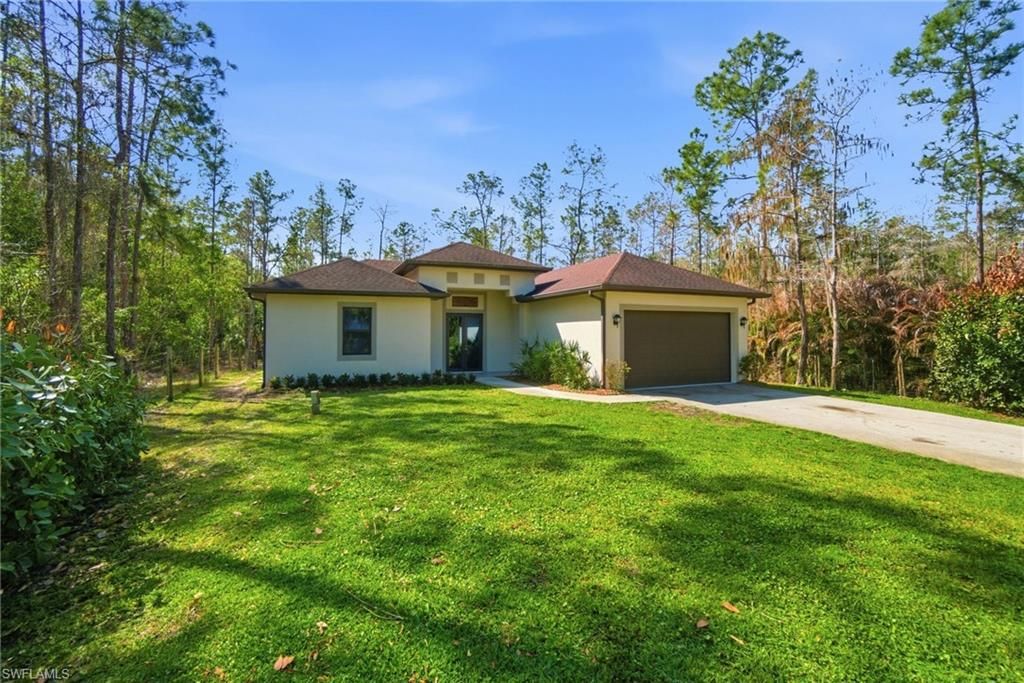 Photo of 4380 2nd AVE NE, NAPLES, FL 34120 (MLS # 226007966)