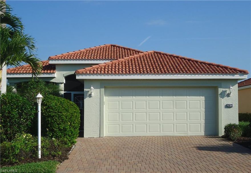 JASMINE model home with LAKE & GOLF COURSE view in the exclusive GATED, GOLF & TENNIS community of Herons Glen is waiting for you!  This maintenance free home on an extra wide lot features 3 bedrooms, 2 baths, granite counter tops in the kitchen, paver drive and walkway, beautiful silk window coverings, tiled lanai & loggia, cabinets in the in-house laundry, accordion shutters plus a new A/C in 2016.  Come enjoy the resort style living in Herons Glen, where the residents own the facilities and amenities are second to none, including Clubhouse, Ballroom, Restaurant/Lounge, Community Pool/Spa, 2 Libraries, Card & Craft Rooms, Shuffleboard, Bocce, Pickle Ball, Billiards, State of the Art Fitness Center, Tennis and Golf is Optional!  CALL TODAY for your private tour!