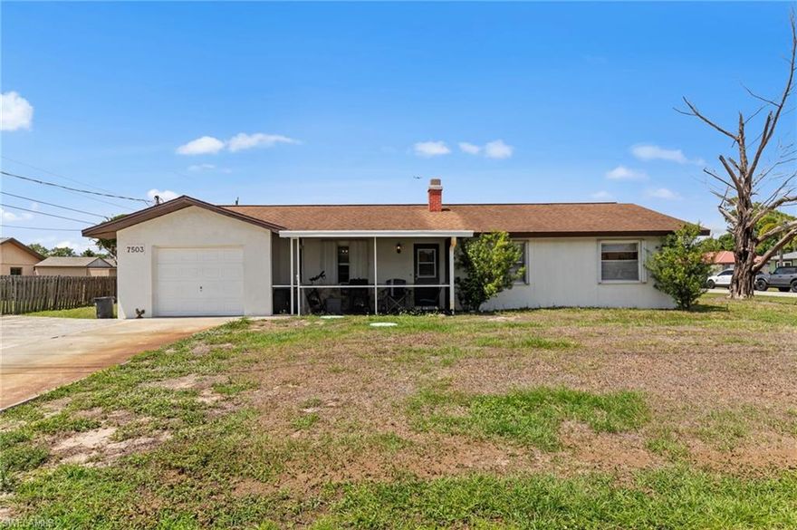 Welcome to this well-maintained 3-bedroom, 2-bath single-family home situated on a spacious corner lot in San Carlos Park, offering comfort, flexibility, and exceptional value—all with no HOA fees. Built with durable concrete block and stucco construction, this home features a warm and inviting interior highlighted by a real wood-burning stone fireplace that adds character and charm. The functional layout includes a bright enclosed Florida room overlooking the backyard—perfect as additional living space, a home office, or hobby area—as well as a relaxing covered screened front lanai ideal for enjoying Florida’s beautiful weather year-round. The oversized wide paved driveway provides ample parking with plenty of room for multiple vehicles, a boat, or RV, in addition to the one-car attached garage and convenient laundry area with utility tub. Recent updates offer peace of mind and long-term value, including: Roof replaced (2019), HVAC replaced (2022), Septic system and drain field replaced (2022), Interior & exterior paint (2024), Electrical panel replaced (2026). The accordion hurricane shutters offer added convenience and storm protection. Ideally located just minutes from US-41, shopping, dining, public golf courses, top-rated schools, Southwest Florida International Airport, and only a short drive to some of Southwest Florida’s beautiful white-sand beaches, this home offers both accessibility and lifestyle appeal. One of the best values currently available in San Carlos Park—schedule your showing today!