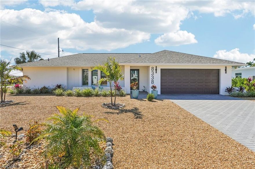 Stunning 3/2/2 waterfront pool home offering direct Gulf access and just steps to the white sands of the Gulf. Located on one of the Island's higher elevation streets, this home had no flooding during Hurricanes Helene or Milton, a rare and valuable advantage. Completely redone from the ground up in 2023/2024, with a new roof,plumbing,electric,
AC,pool heater,impact windows,and so much more!The porcelain wood-plank tile flows seamlessly through the home,complemented by nuetral finishes. The bright white kitchen is the center of the open floor plan and features raised panel cabinetry,stainless appliances,quartz counters and huge Island,perfect for entertaining.The interior also features the desired split floor plan,custom tiled showers and a large primary suite with a large walk-in closet and sliders to to your backyard Oasis.The outdoor living is exceptional with a direct Gulf access canal,private dock and lift,and additional cut-in concrete dock perfect for relaxing waterside and watching the Manatees play.Enjoy the heated pool,low-maintenance zeroscape yard,and convenient outdoor shower after a day at the beach or on the boat. This home is ideal as your new primary residence,vacation home or investment opportunity.