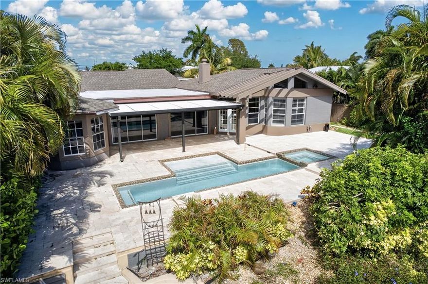 200’ WIDE DIRECT GULF ACCESS CANAL – MINUTES TO OPEN WATER! This exceptional waterfront property offers the boating lifestyle serious boaters are looking for, with quick direct access to the Caloosahatchee River and the Gulf of Mexico. Enjoy quick and easy navigation from your private dock featuring a BOAT LIFT and walk-around dock, making it effortless to step aboard and be on open water within minutes.

This 2,600+ sq. ft. POOL home features 3 bedrooms, 2½ bathrooms, and a DEN with travertine flooring throughout and an open GREAT ROOM floor plan designed for comfortable coastal living. The large contemporary kitchen with oversized island and breakfast bar open to the main living space

The spacious master suite addition (2009) is a private retreat with vaulted ceilings, a stone-faced fireplace, and a luxurious en-suite bath featuring a custom soaking tub and walk-in shower.

Outdoor living is equally impressive with a pool featuring a swim shelf and expansive travertine pool deck, perfect for relaxing after a day on the water.

Recent updates include new replumb (2023), lanai roof (2024), and newer A/C. Located in SE Cape Coral, this home also offers convenient access to shopping, dining, and the Cape Coral Bridge.

Wide canal. Direct Gulf access. Minutes to open water. A true boater’s location.
