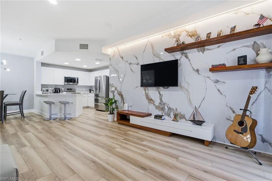 Awesome Interior Remodel.   Large Master Suite.  Second Bedroom Will Accommodate A King Set. 
This is one of the nicest condos in the community.   Five minute walk to the resort style pool and full modern gym.
Play Ground Pickle Ball Dog Park Two Lakes    Aldi's is a 10 min walk  This is a gated community with modern three story elevator buildings.